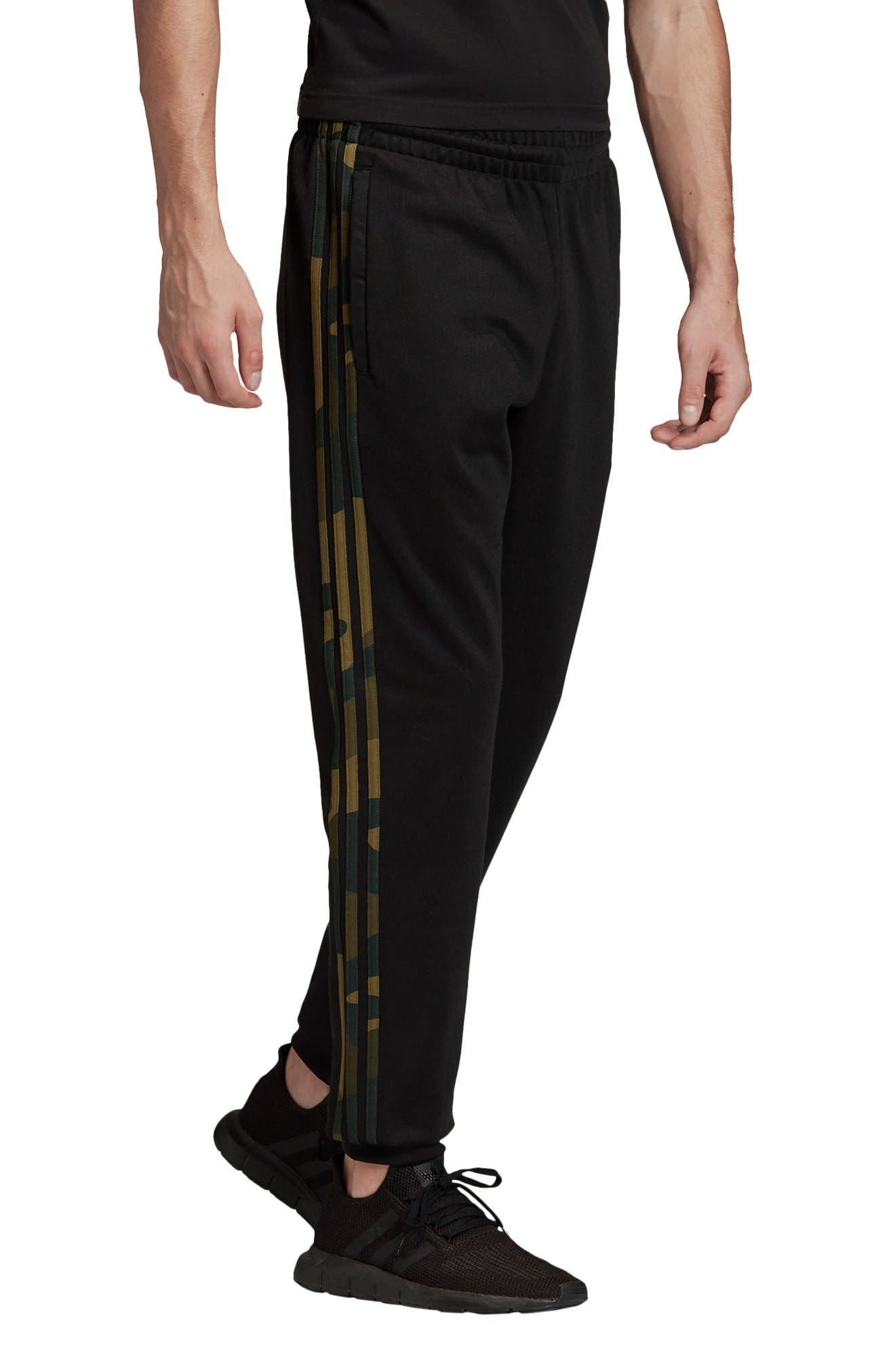adidas the brand with the 3 stripes pants