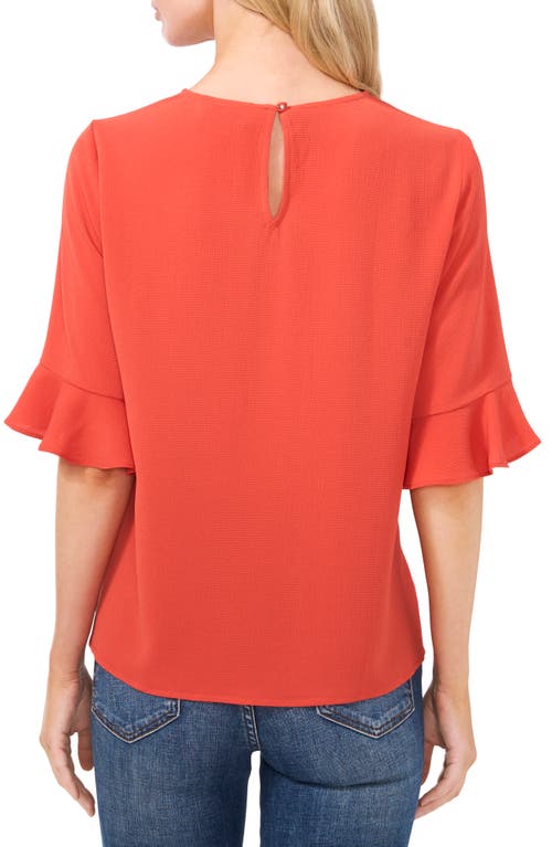 Shop Cece Ruffle Cuff Blouse In Chili Orange