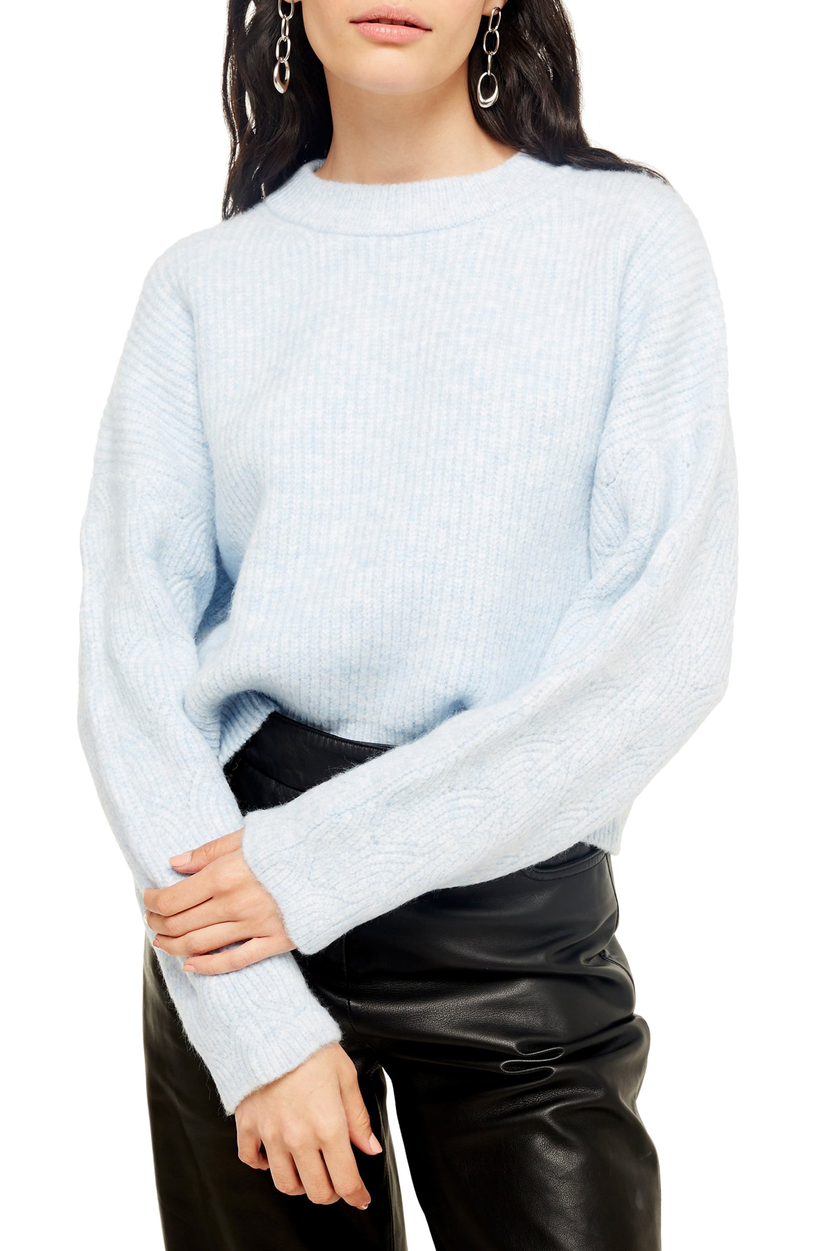 sweater with cable knit sleeves