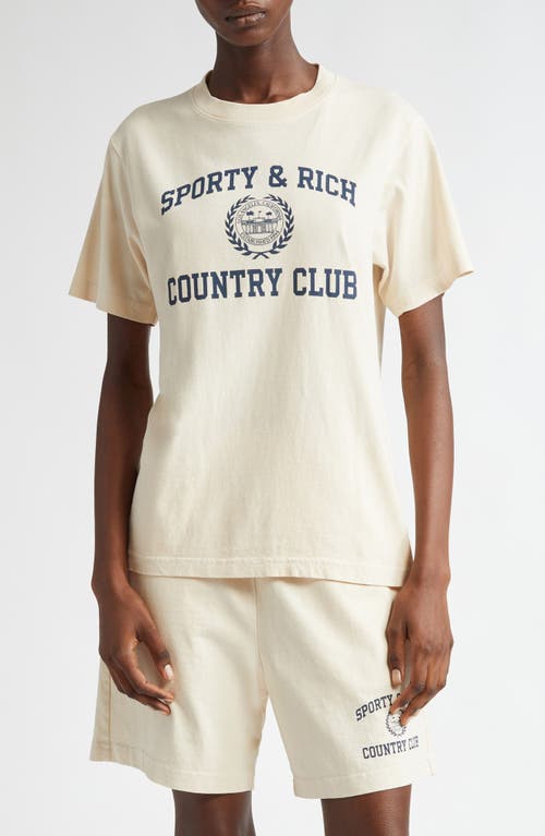 Shop Sporty And Rich Sporty & Rich Varsity Crest Cotton Graphic T-shirt In Cream