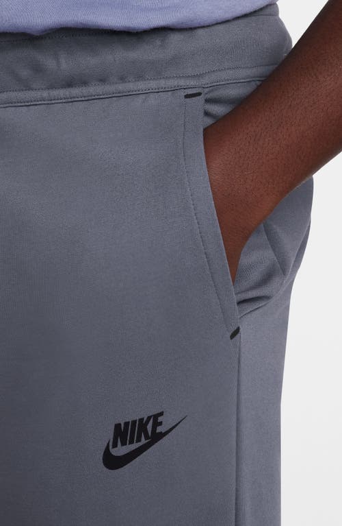 Shop Nike Lightweight Tech Knit Joggers In Light Carbon/black