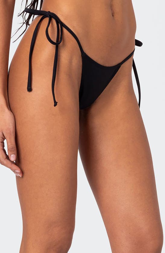 Shop Edikted Elora Side Tie Bikini Bottoms In Black