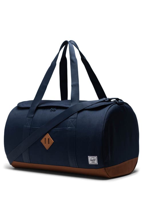 Shop Herschel Supply Co . Heritage Duffle Bag In Navy/saddle Brown