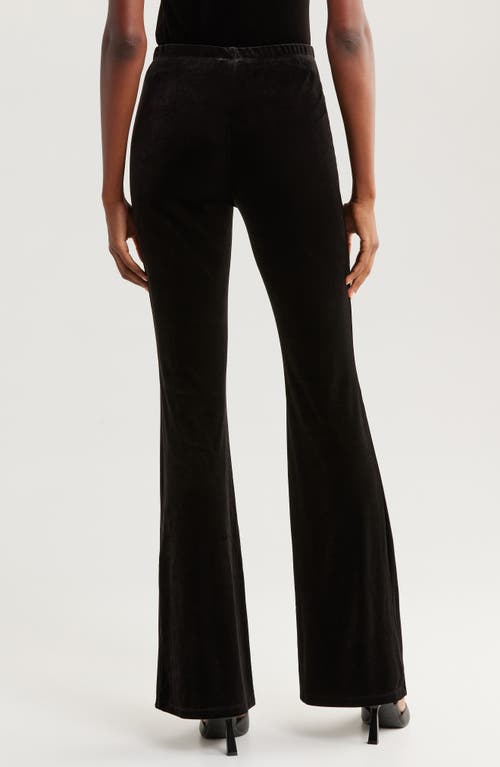 Shop Good American Stretch Velvet Flare Leg Pants In Black001