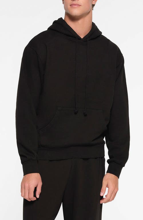 Shop Skims Cotton Pullover Hoodie In Washed Obsidian