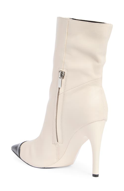 Nine West Winner Pointed Toe Boot In Chic Cream/nero