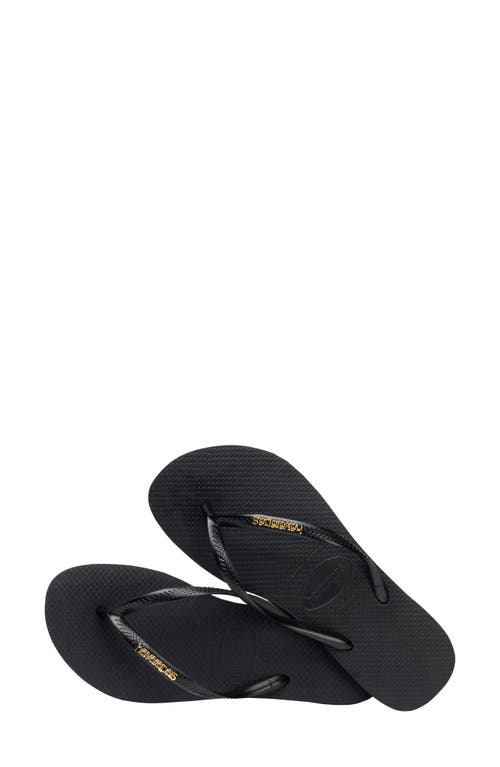 Shop Havaianas Slim Logo Metallic Flip Flop In Black/golden