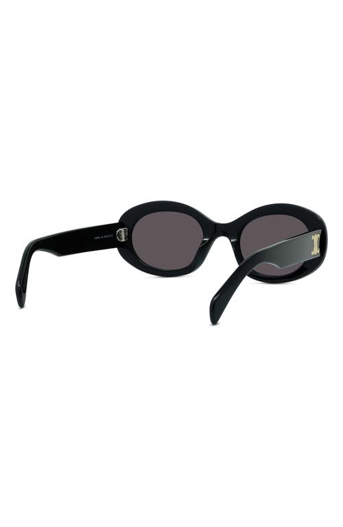 Shop Celine Triomphe 52mm Oval Sunglasses In Shiny Solid Black/smoke