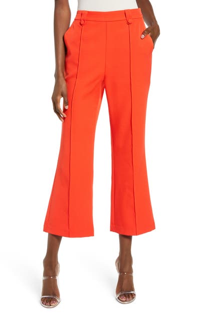 Click to view more detailed imagery on our partner's website English Factory Button Detail Center Seam Flare Crop Trousers In Red