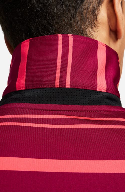 Shop Nike Golf Tour Stripe Golf Polo In Noble Red/ember Glow/white