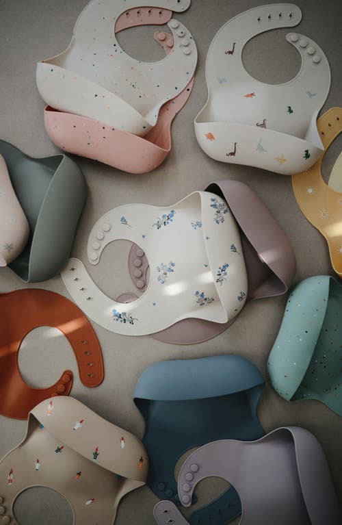 Mushie Dinosaurs Silicone Bib In Sand