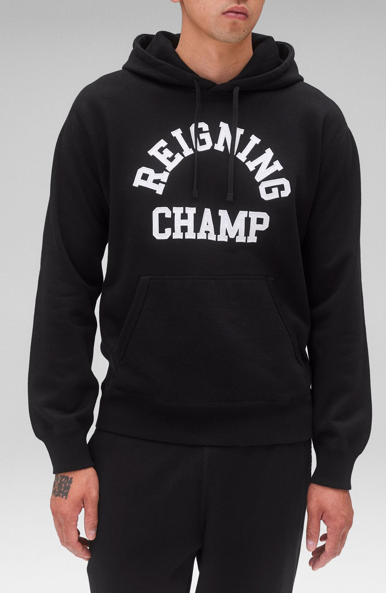 Reigning Champ Arch Logo Midweight Cotton French Terry Hoodie in Black 