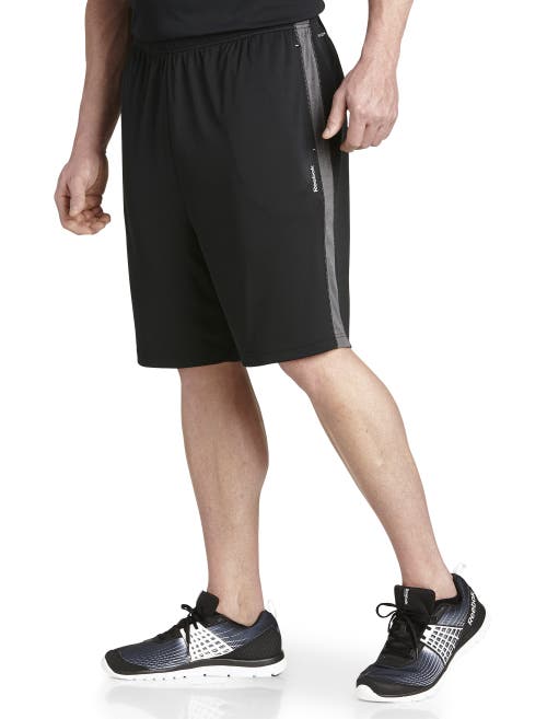 Shop Reebok Performance Insert Tech Athletic Shorts In Black Grey