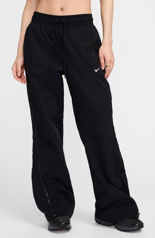 Shop Nike Sportswear Repel Zip Hem Pants In Black/white