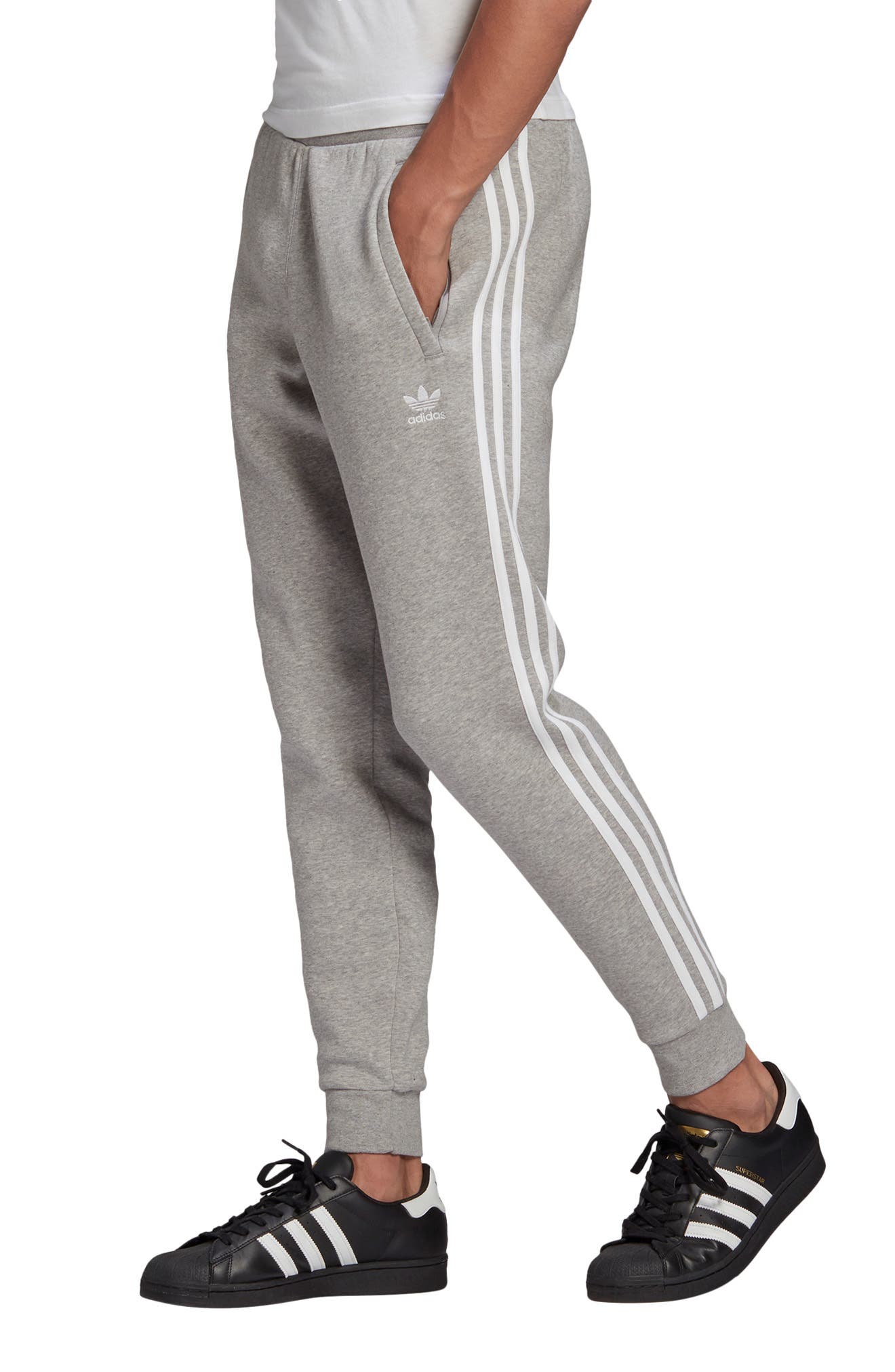 grey sweatpants with black stripe