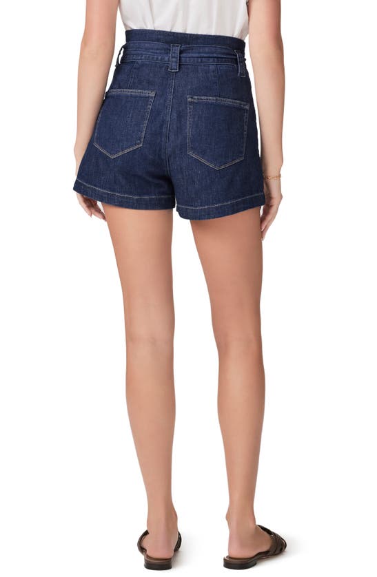 Shop Paige Anessa Belted High Waist A-line Denim Shorts In Baltimore