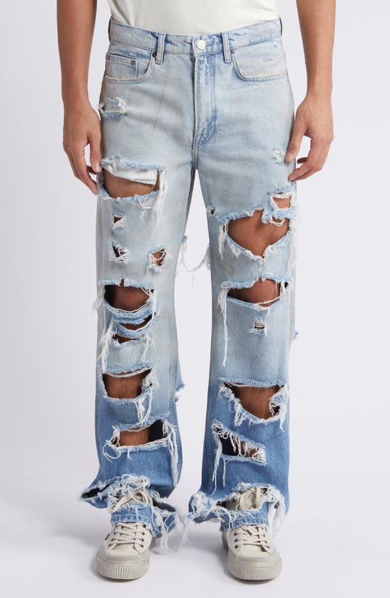 Shop Frame The Boxy Ripped Straight Leg Jeans In Lagoon Rips