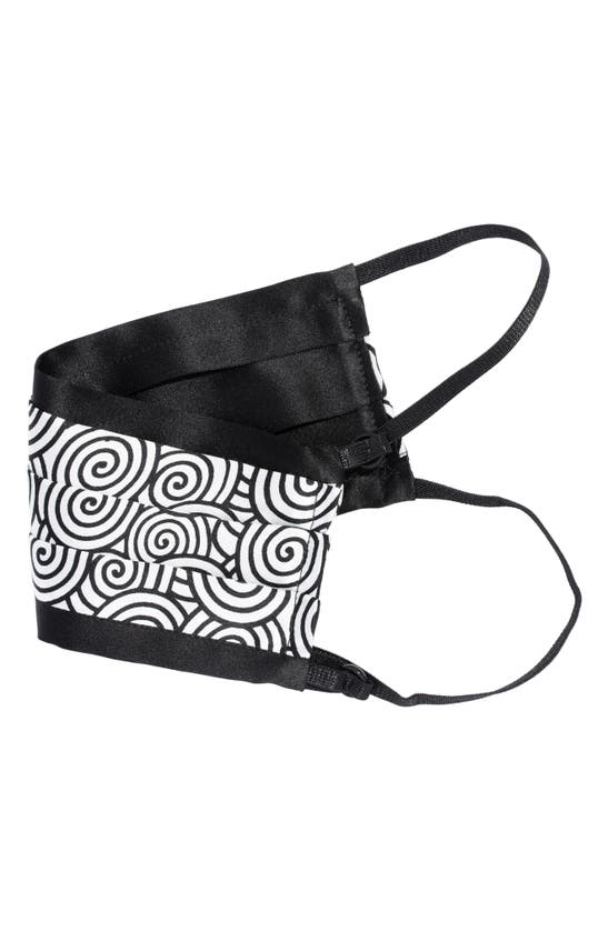 Click to view more detailed imagery on our partner's website L. Erickson L Erickson Peace Adult Reversible Silk Face Mask In Black/ White Pinwheels
