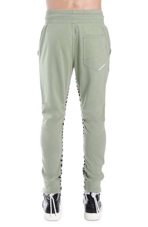 Shop Hvman Logo Knit Track Pants In Green