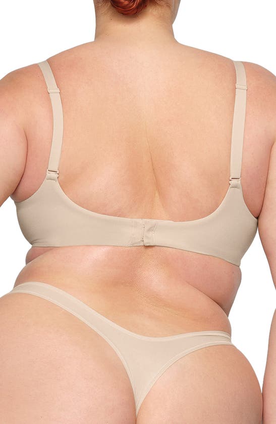 Shop Skims Fits Everybody Unlined Demi Bra In Sand