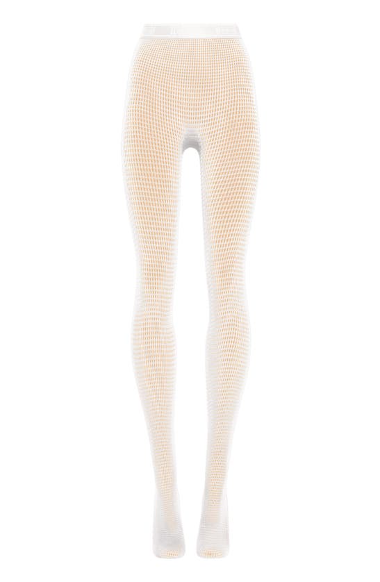 Shop Wolford Grid Net Tights In White