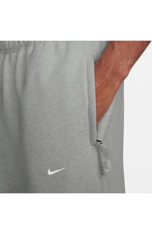 Shop Nike Solo Swoosh Fleece Sweatpants In Dark Grey Heather/white