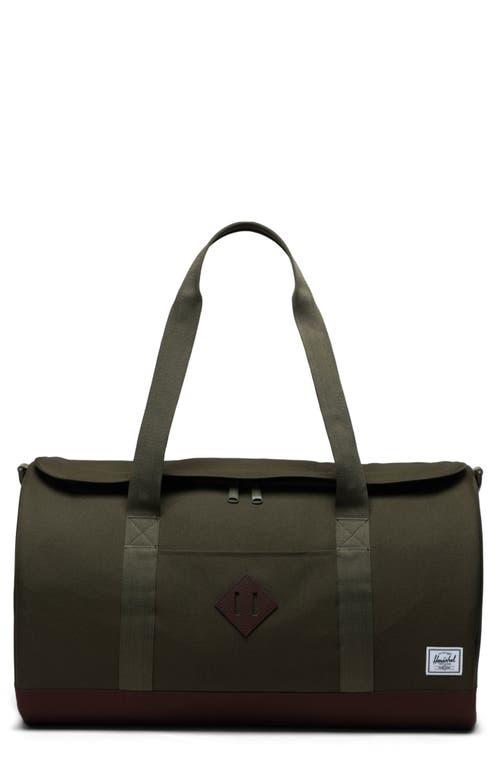 Shop Herschel Supply Co . Heritage Duffle Bag In Ivy Green/chicory Coffee