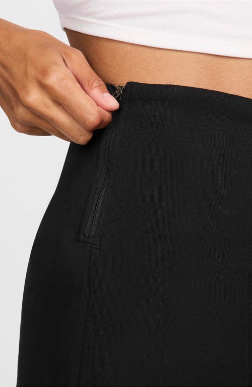 Shop Nike Tech Fleece High Waist Pleated Shorts In Black/black