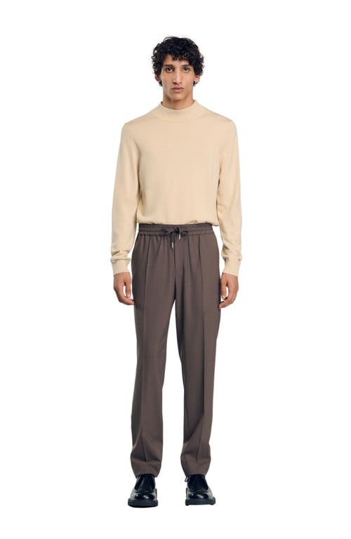 Shop Sandro Elasticated Waist Trousers In Taupe