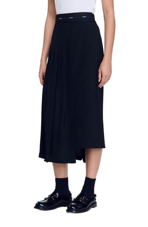 Shop Sandro Long Asymmetrical Skirt In Black