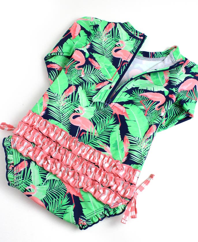 Shop Rufflebutts Girls Long Sleeve Upf50+ One Piece Rash Guard In Flamingo Frenzy
