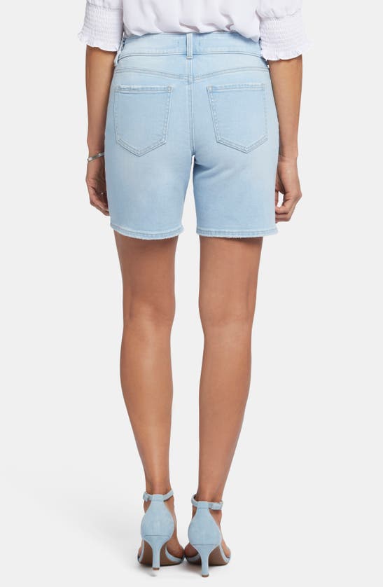 Shop Nydj Frankie Mid Length Relaxed Denim Shorts In Estrella