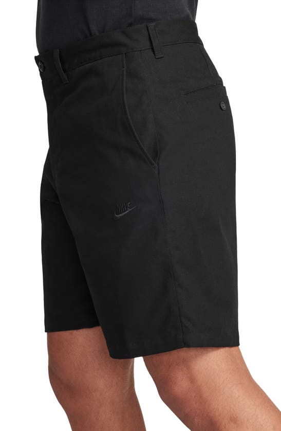 Shop Nike Club Flat Front Chino Shorts In Black/ Black