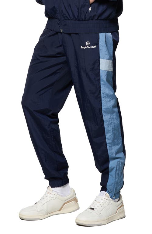 Shop Sergio Tacchini Angolo Zip Cuff Crinkle Nylon Track Pants In Maritime Blue