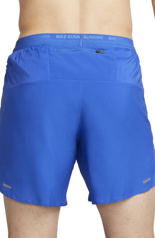 Shop Nike Dri-fit Stride 7-inch Brief-lined Running Shorts In Game Royal/black