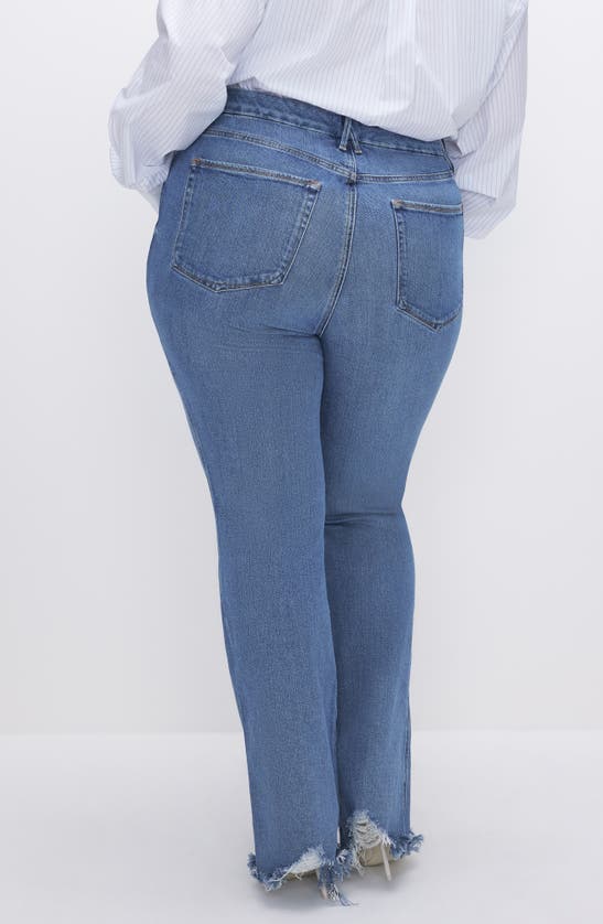 Shop Good American Good Curve Chew Hem Bootcut Jeans In Indigo631