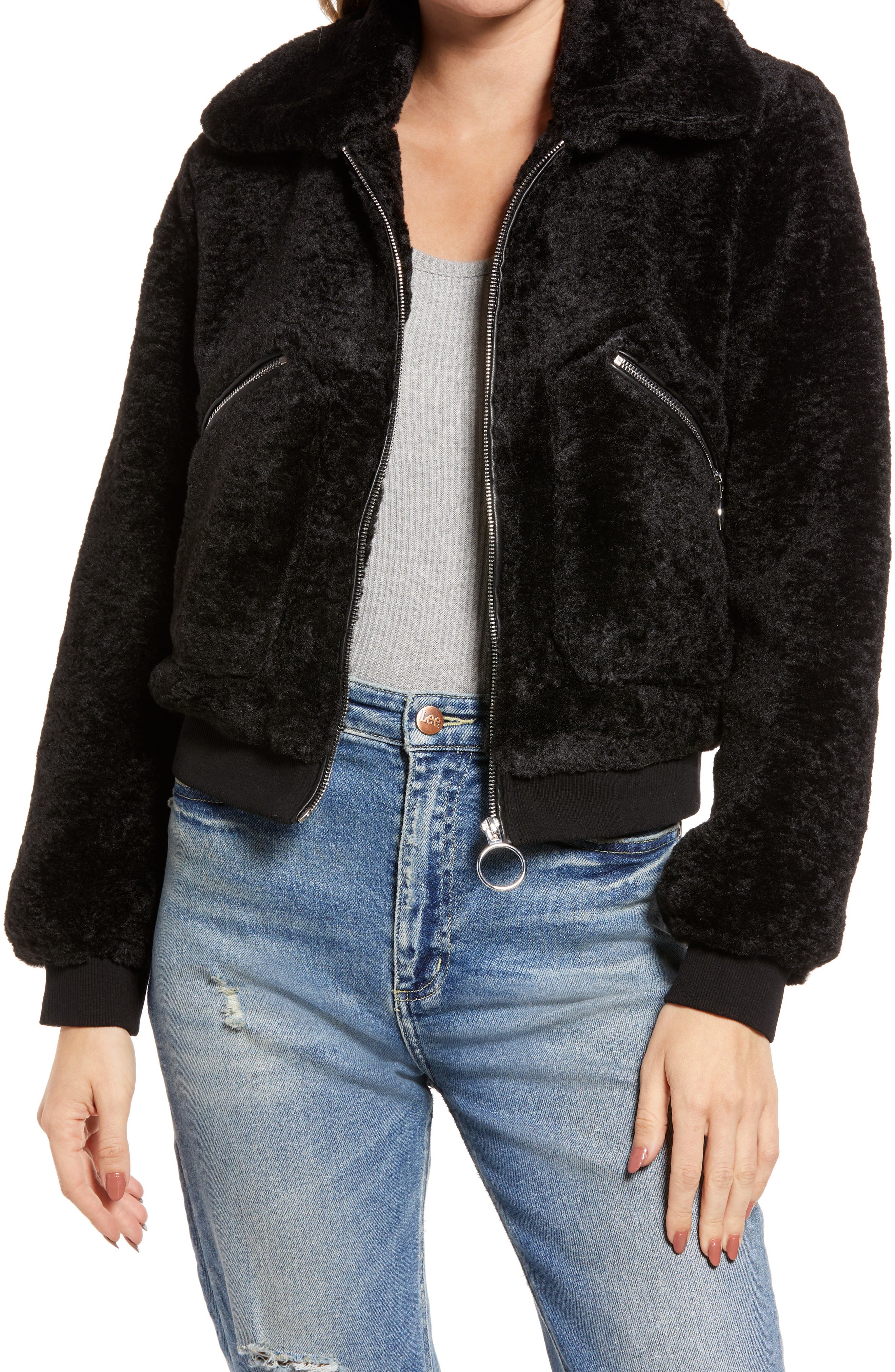 black winter jacket with black fur hood