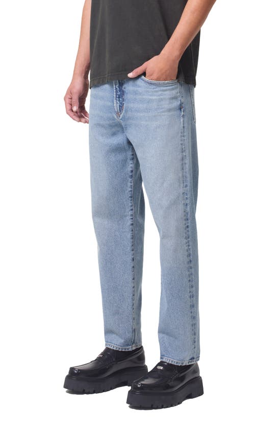 Shop Agolde Curtis Relaxed Tapered Jeans In Turmoil