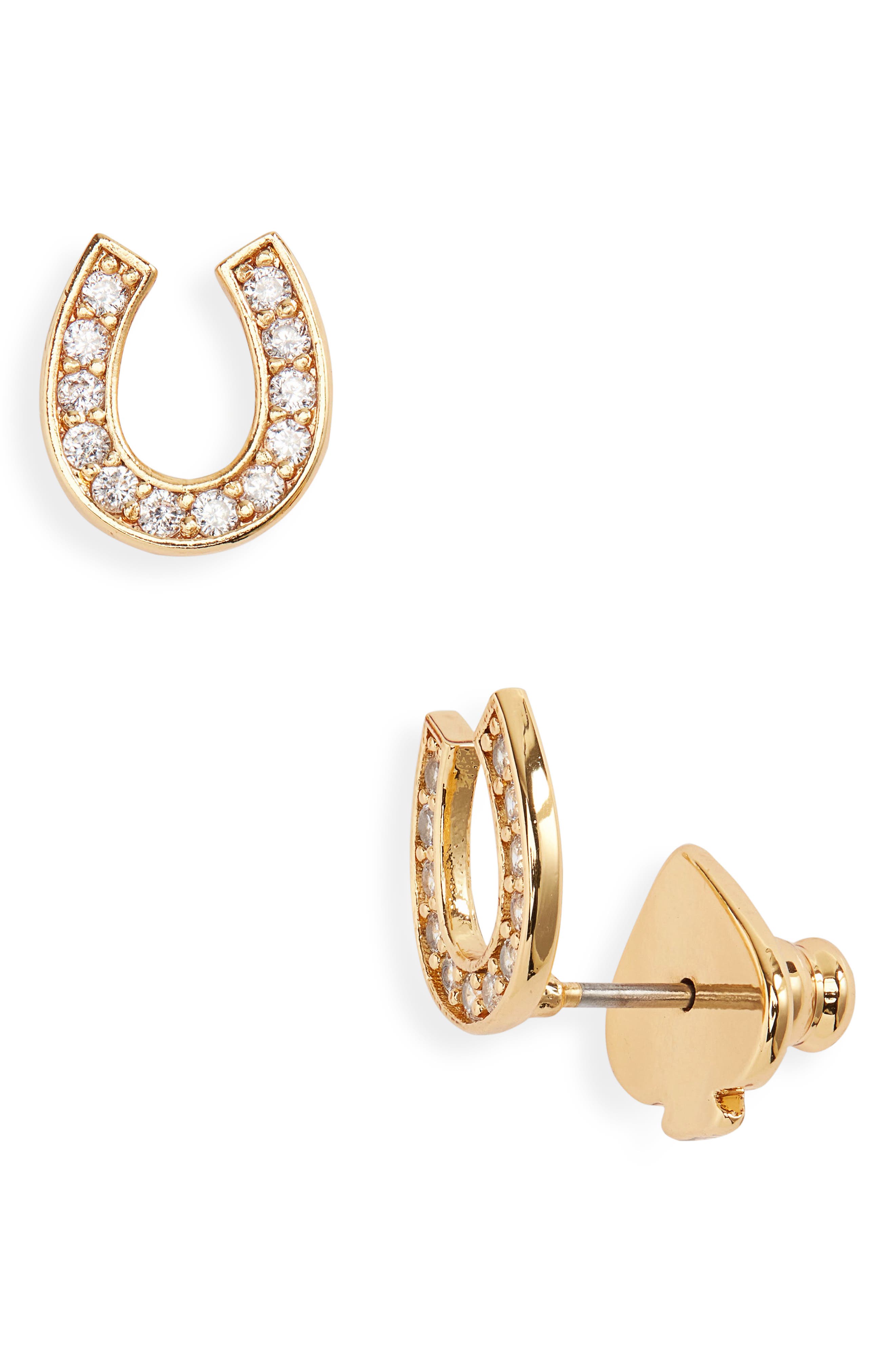 Kate Spade New York cubic zirconia horseshoe stud earrings in Clear/Gold. Cover