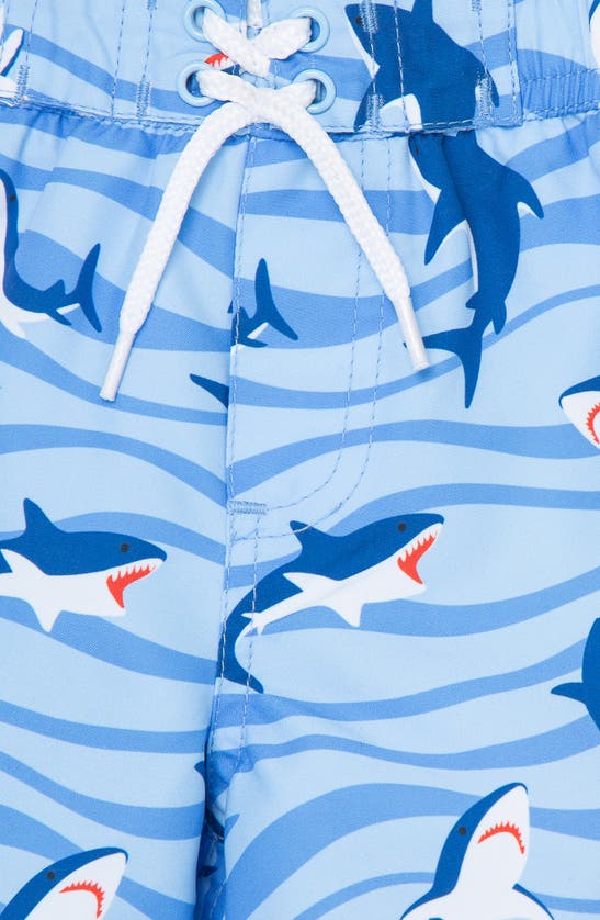 Shop Little Me Shark Swim Trunks In Blue