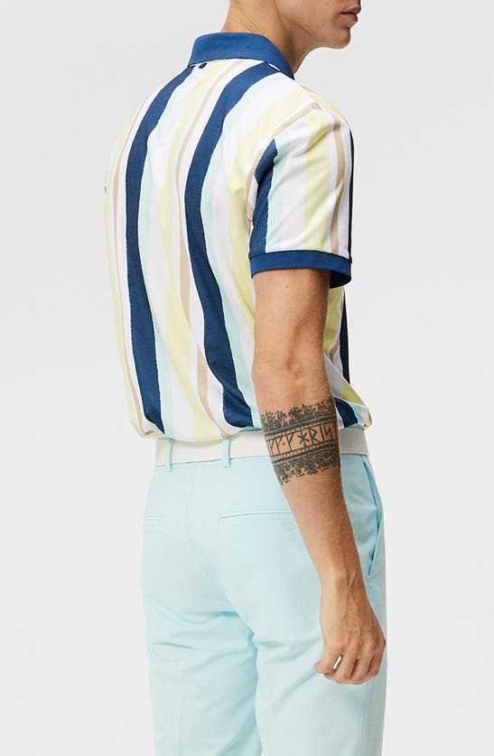 Shop J. Lindeberg Regular Fit Stripe Tour Tech Performance Golf Polo In Painted Stripe Wax Yellow