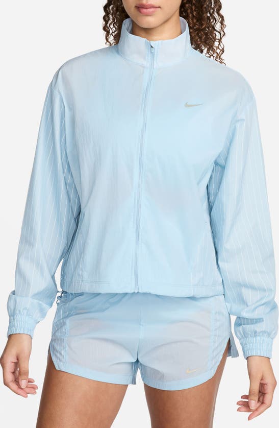 Shop Nike Running Division Reflective Water Repellent Jacket In Light Armory Blue/ Ashen Slate