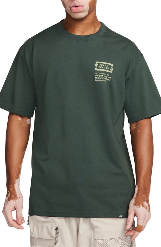 Shop Nike Dri-fit Acg Pack It Out Oversize Graphic T-shirt In Vintage Green