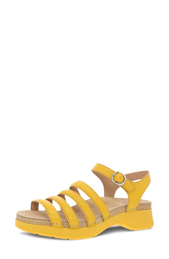 Shop Dansko Roxie Sandal In Yellow