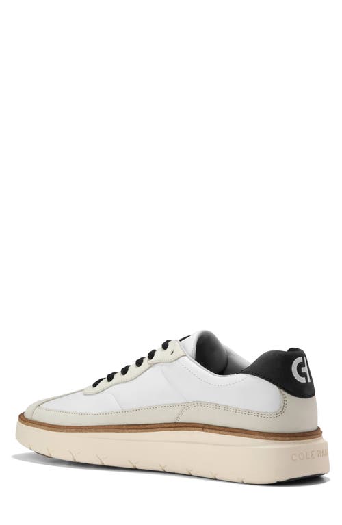 Shop Cole Haan Grandpro Featherarc Sneaker In White/blac