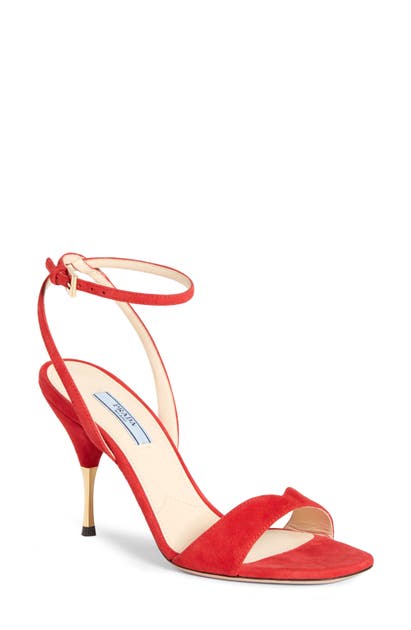 Click to view more detailed imagery on our partner's website Prada Golden Heel Sandal In Rosso Suede