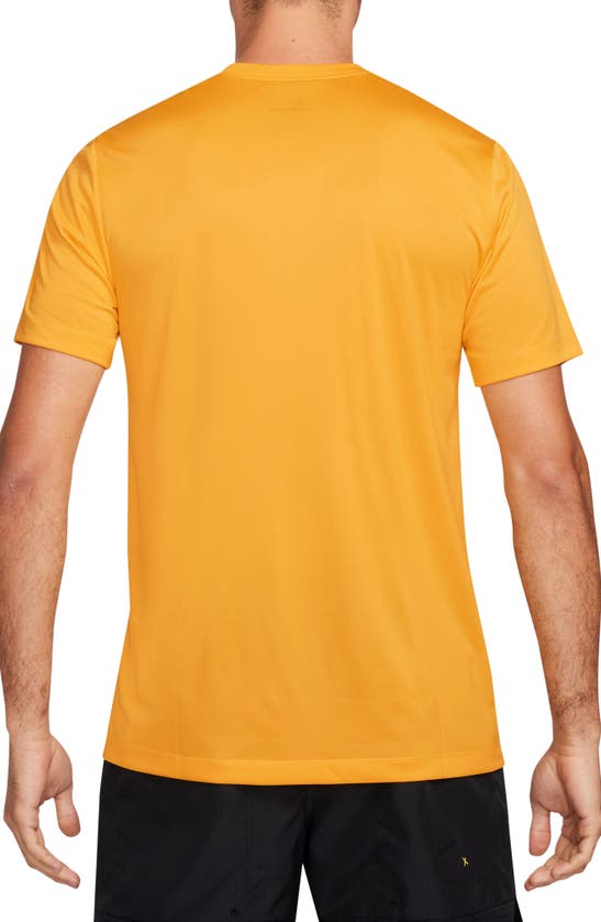 Shop Nike Dri-fit Legend T-shirt In University Gold/ White