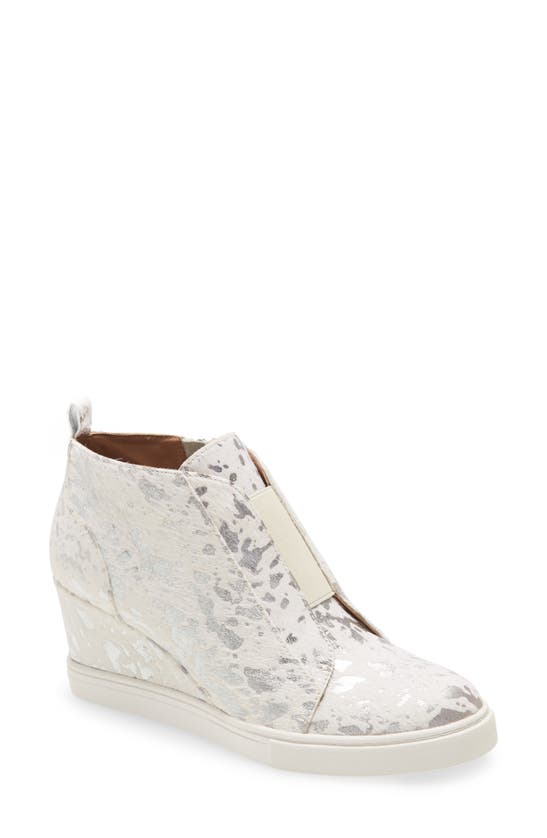 Linea Paolo Felicia Iii Wedge Sneaker In White/silver Print Calf Hair