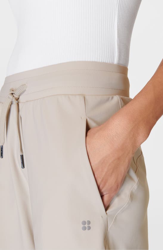 Shop Sweaty Betty Explorer Tie Waist Shorts In Mineral Beige