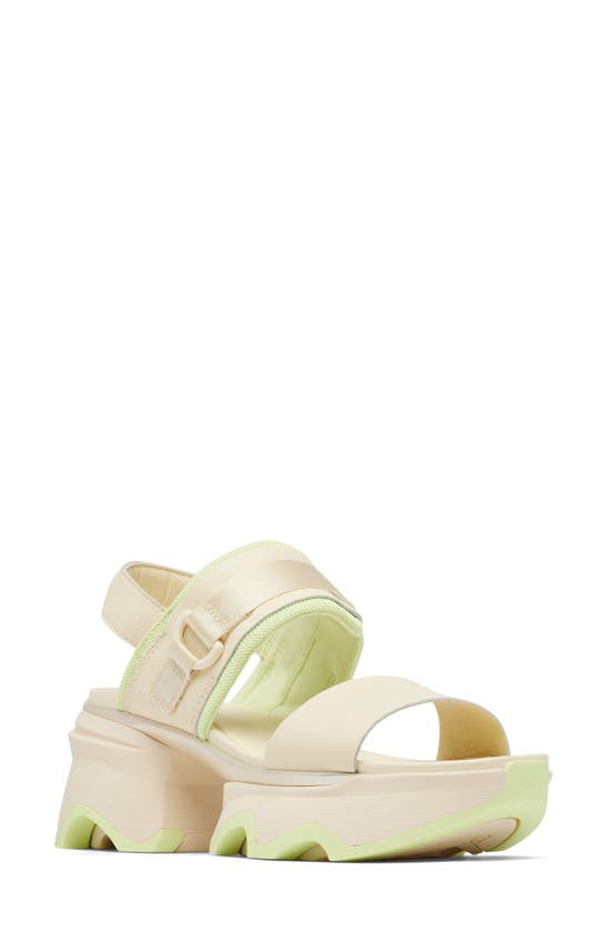 Shop Sorel Kinetic Impact Slingback Sandal In Honey White/ Luminous Lime